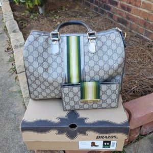 100% Gucci Handbag and matching wallet.